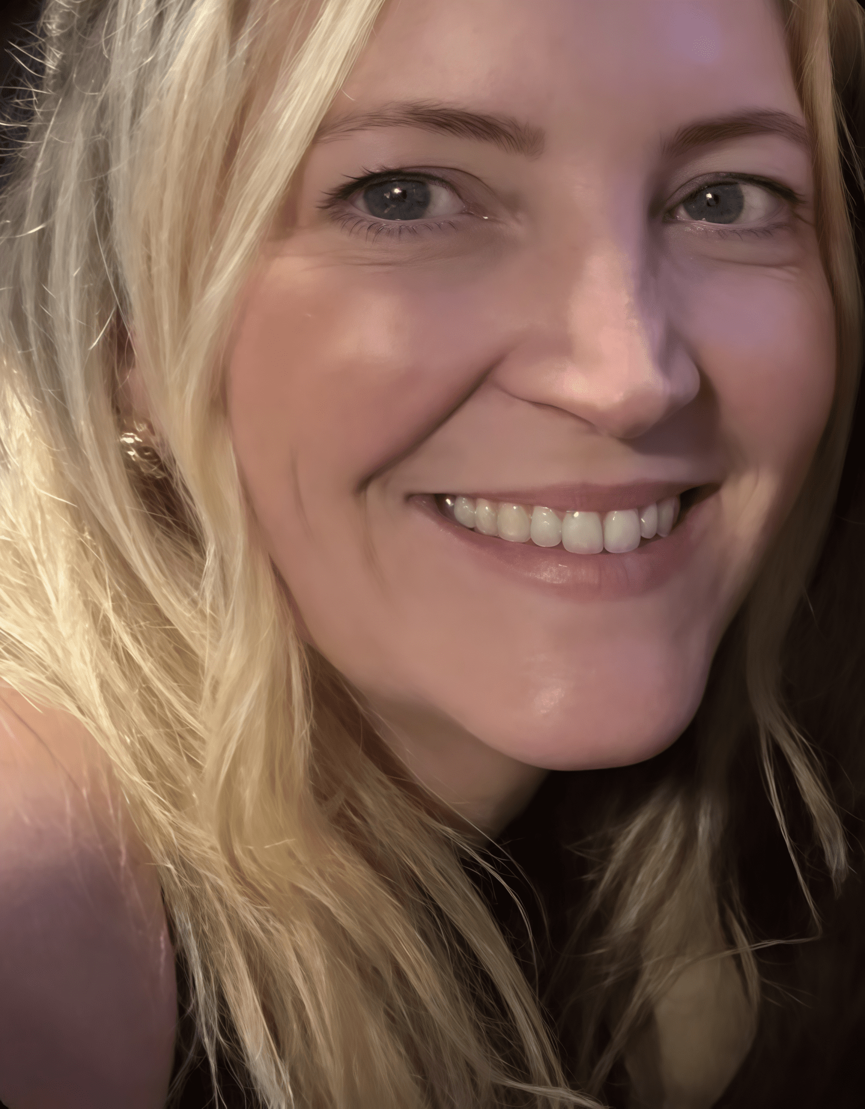 Smiling woman with blonde hair