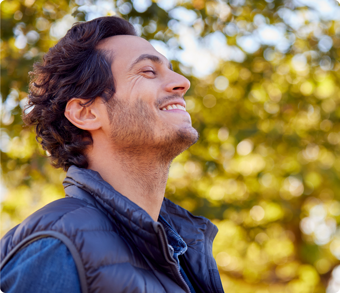 Relaxed individual in sunny park